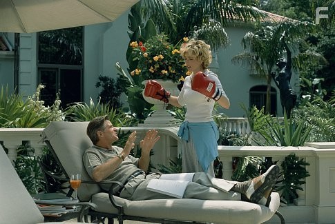 Studio head Hal Yeager (TREAT WILLIAMS) and his fiancee Ellie (T?A LEONI) discuss the progress of their latest film project, being directed by Ellie's ex-husband, in Woody Allen's latest contemporary comedy HOLLYWOOD ENDING, being distributed domestically by DreamWorks.