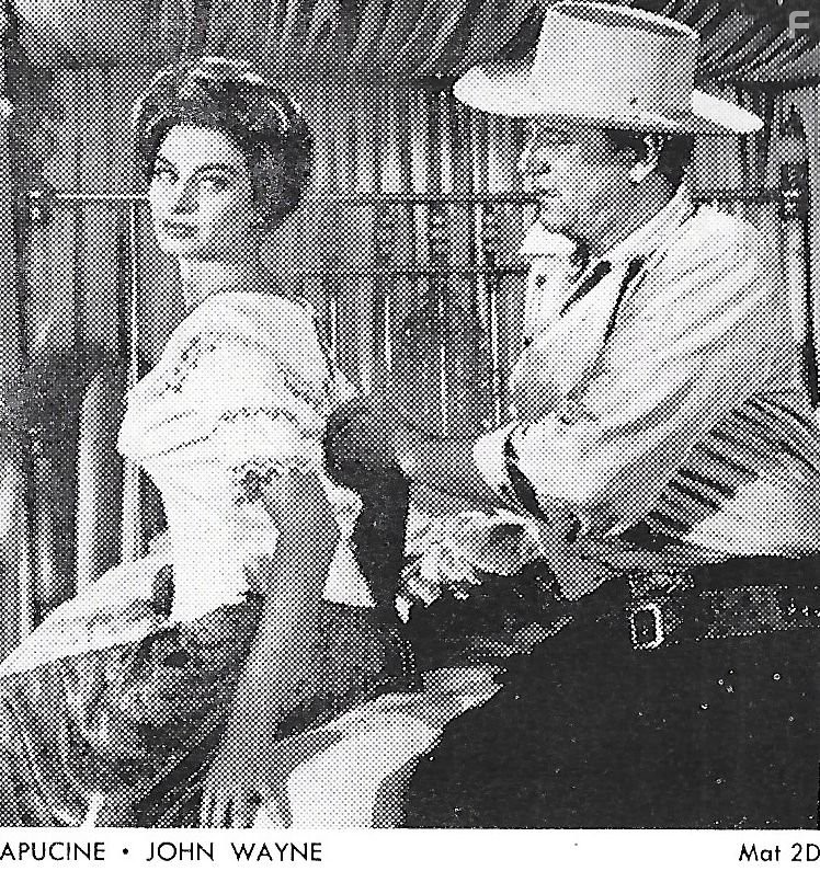 John Wayne and Capucine in К северу от Аляски (1960)