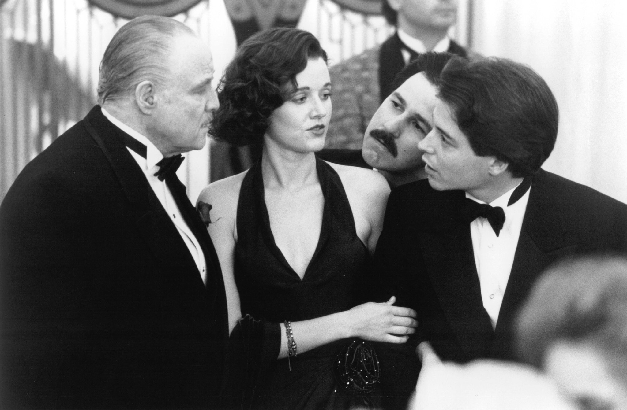 Marlon Brando, Matthew Broderick, Penelope Ann Miller, and Bruno Kirby in Новичок (1990)