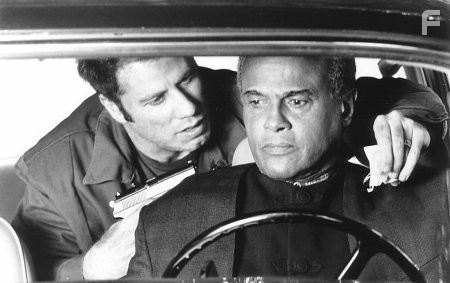 John Travolta and Harry Belafonte in Участь белого человека (1995)