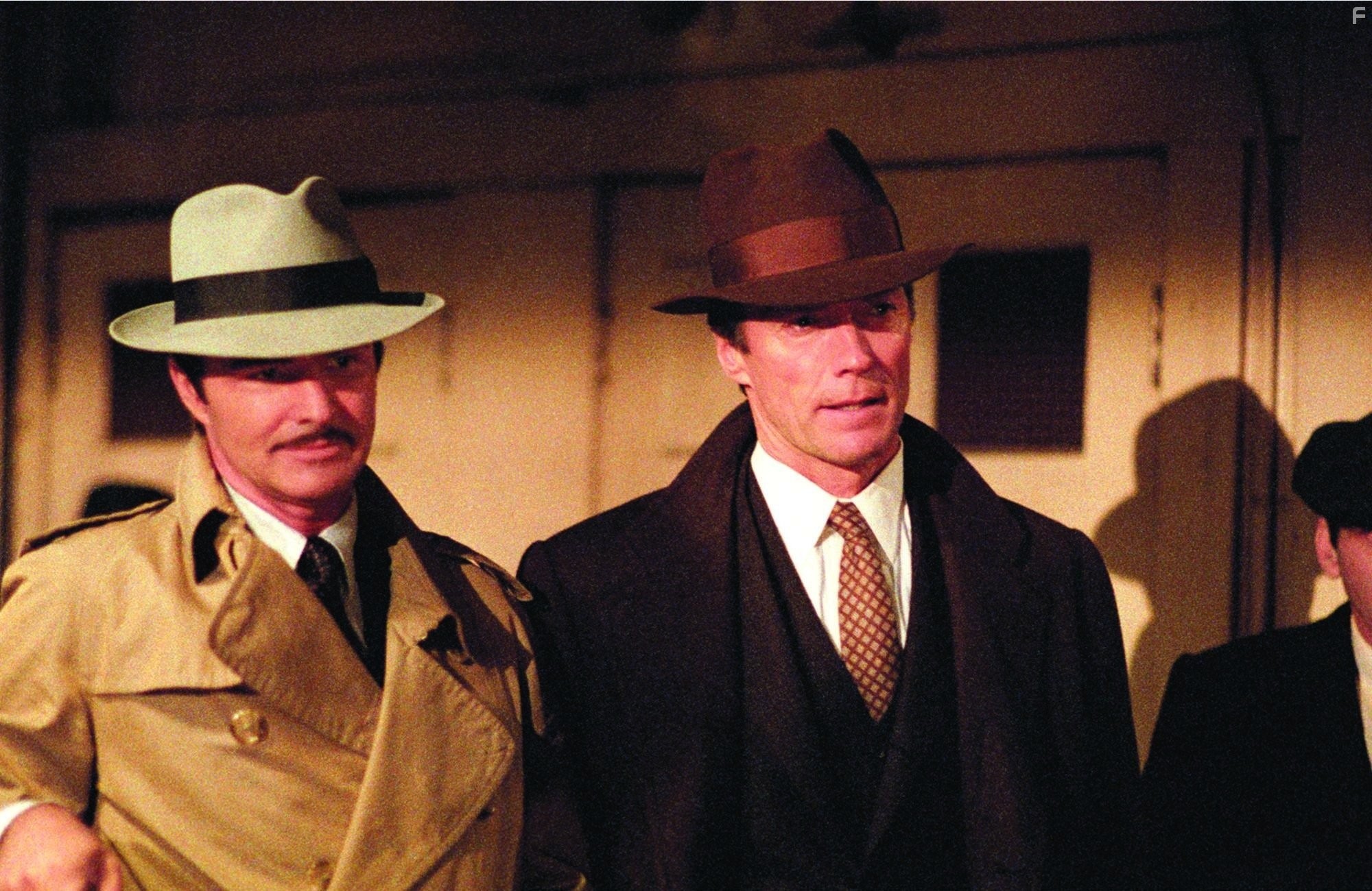 Clint Eastwood and Burt Reynolds in Заваруха в городе (1984)