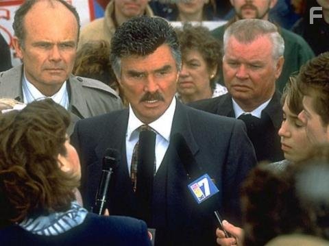 Burt Reynolds co-stars as Blaine Gibbons