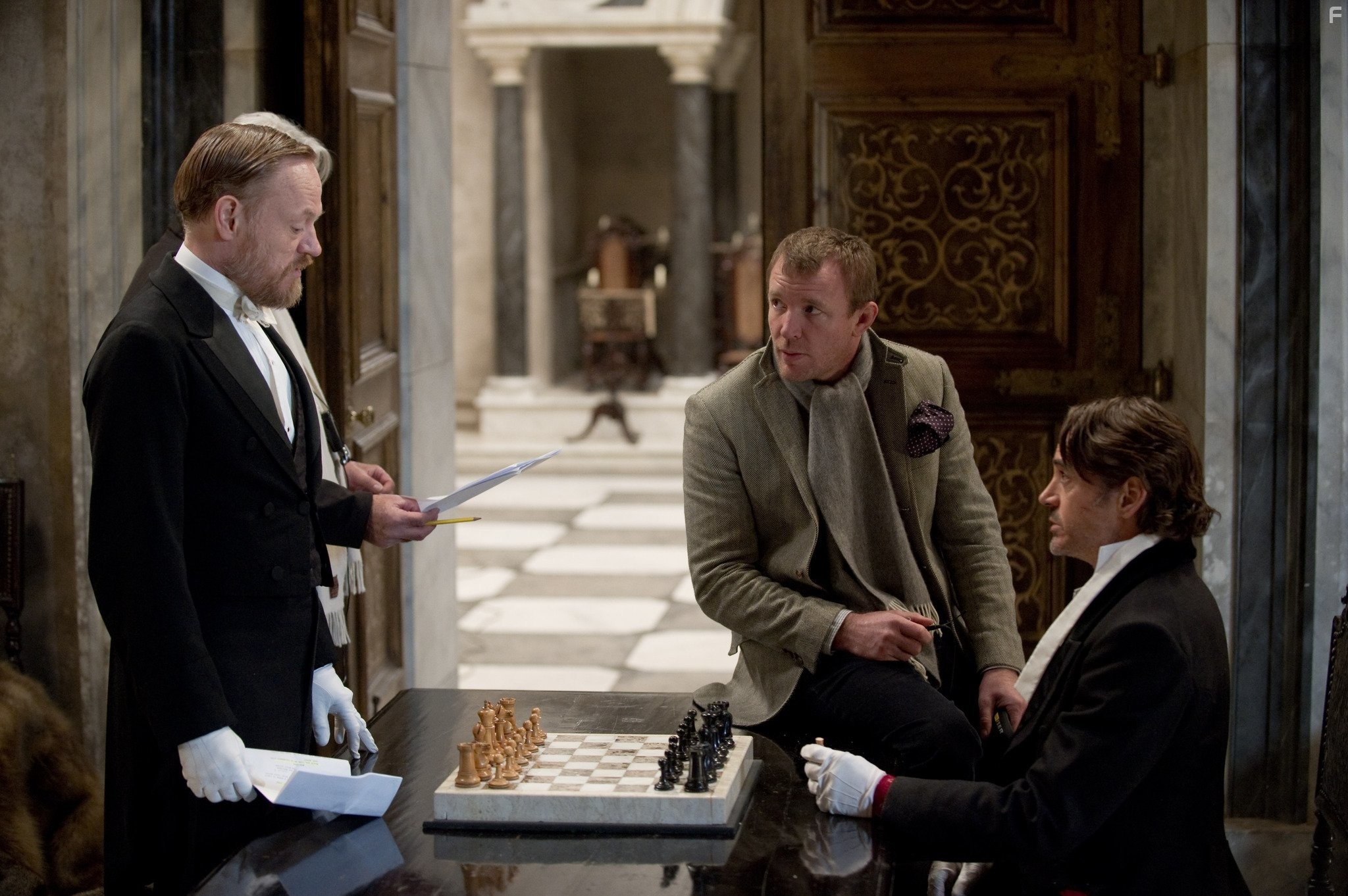 Robert Downey Jr., Guy Ritchie, and Jared Harris in Шерлок Холмс: Игра теней (2011)