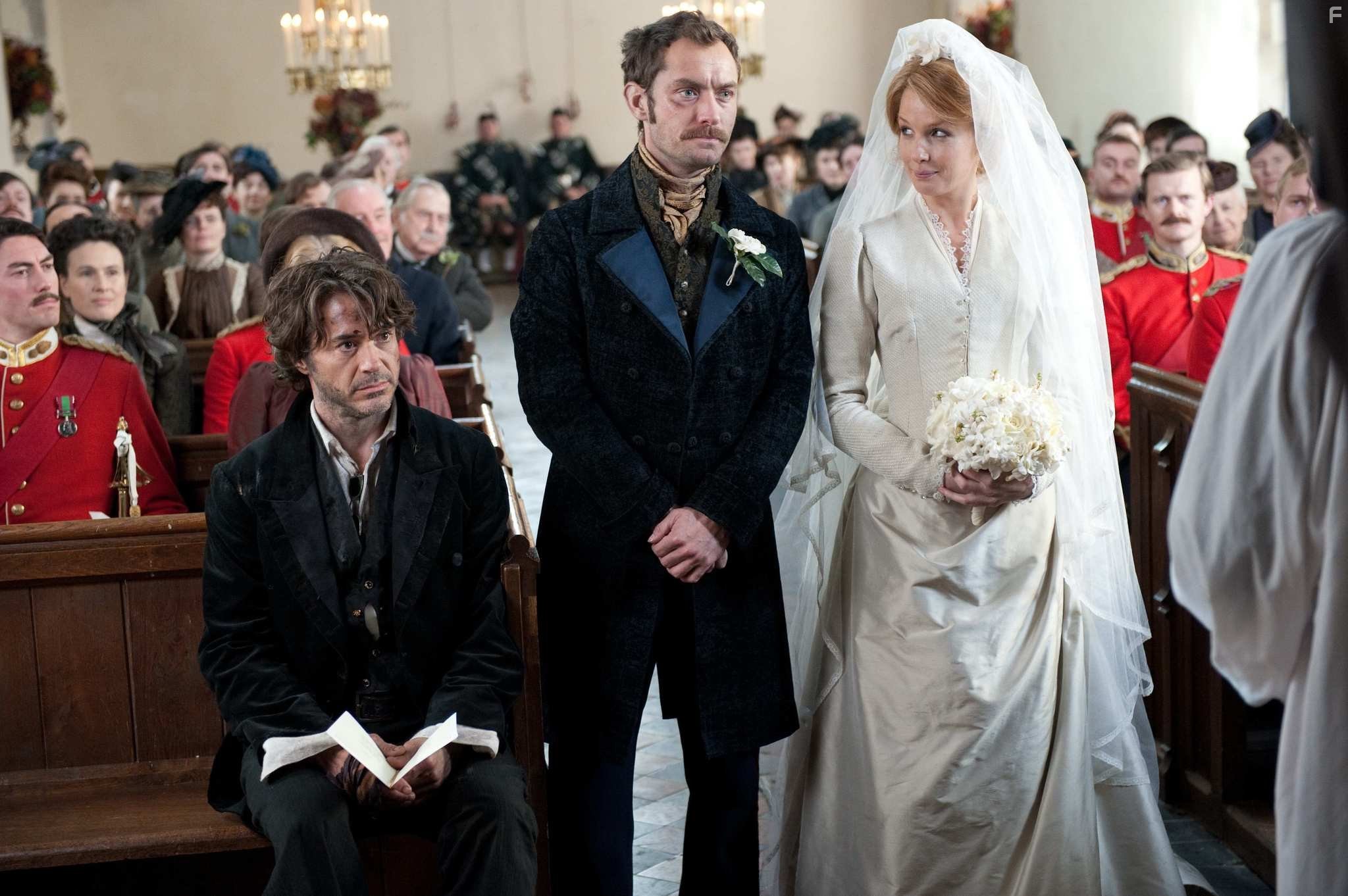 Jude Law, Robert Downey Jr., and Kelly Reilly in Шерлок Холмс: Игра теней (2011)