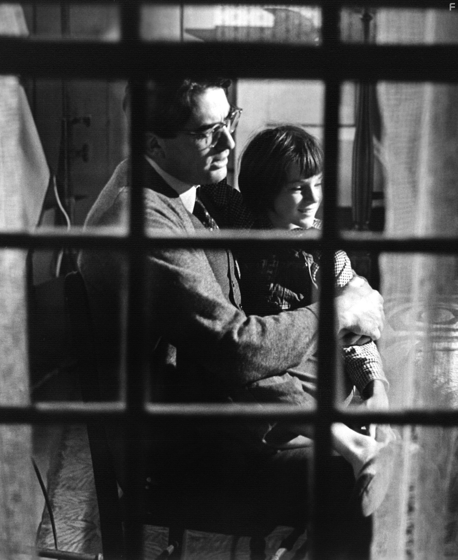 Gregory Peck and Mary Badham in Убить пересмешника (1962)