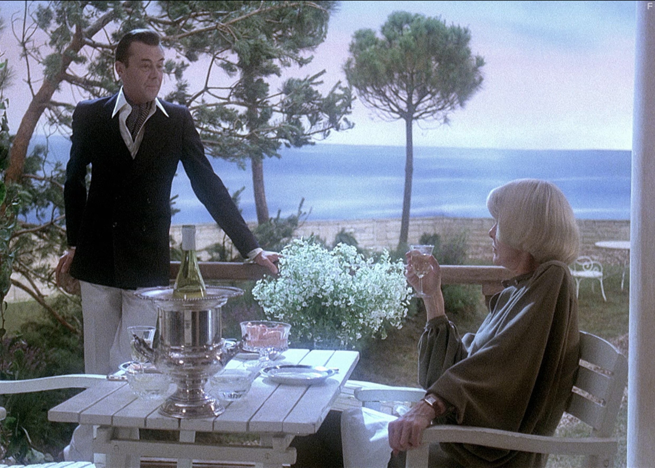 Dirk Bogarde and Elaine Stritch in Провидение (1977)