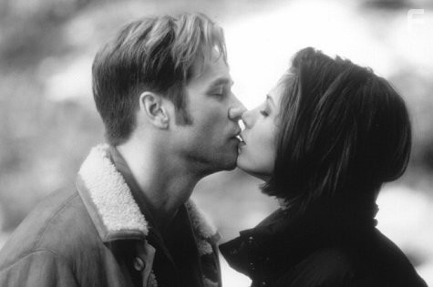 Val Kilmer and Mira Sorvino in С первого взгляда (1999)
