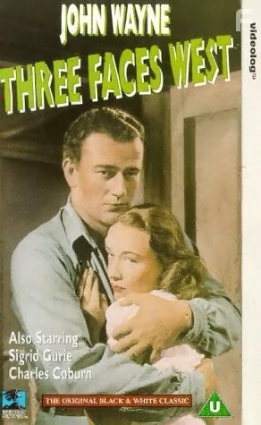 John Wayne and Sigrid Gurie in Three Faces West (1940)