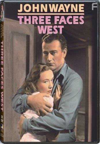 John Wayne and Sigrid Gurie in Three Faces West (1940)