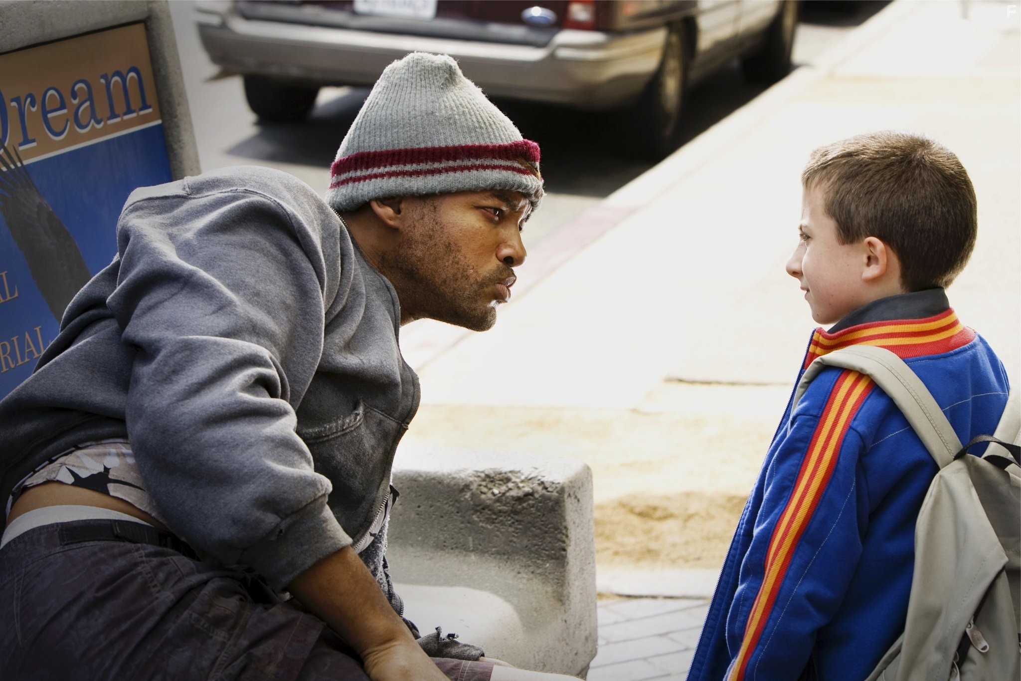 Will Smith and Atticus Shaffer in Хэнкок (2008)