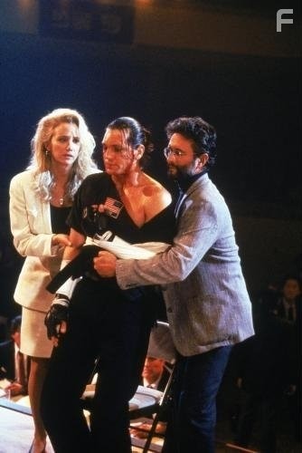 Sally Kirkland and Eric Roberts in Лучшие из лучших (1989)