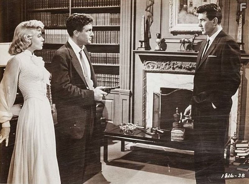Rock Hudson, Dorothy Malone, and Robert Stack in Слова, написанные на ветру (1956)