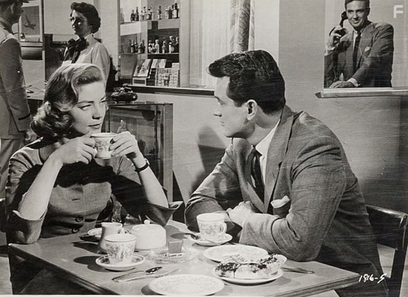 Lauren Bacall and Rock Hudson in Слова, написанные на ветру (1956)