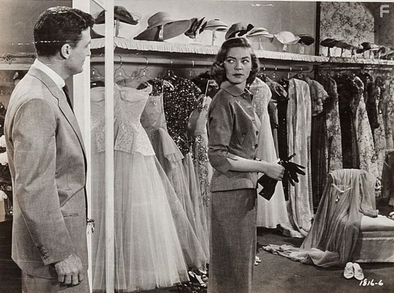 Lauren Bacall and Robert Stack in Слова, написанные на ветру (1956)