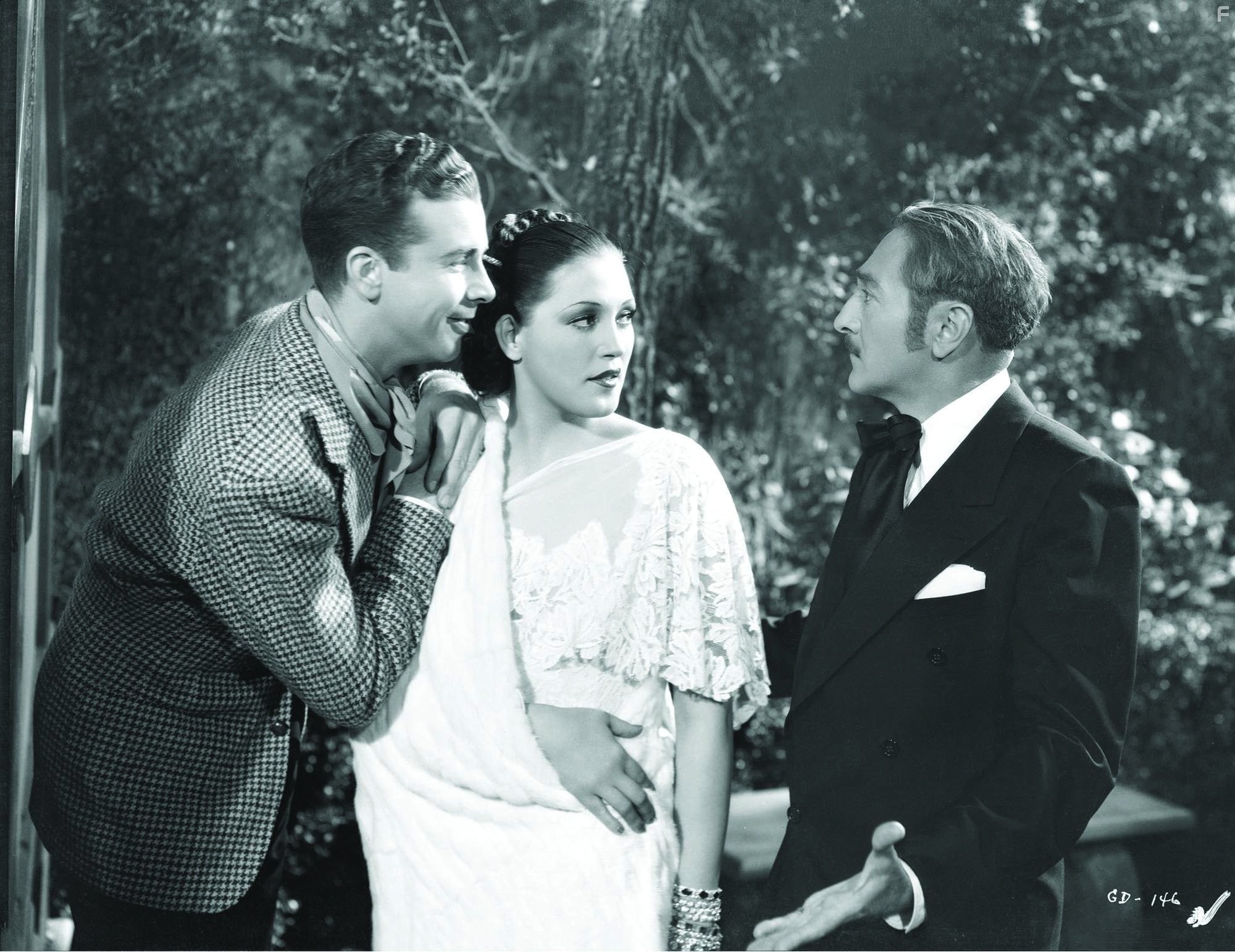 Adolphe Menjou and Dick Powell in Золотоискатели 1935-го года (1935)