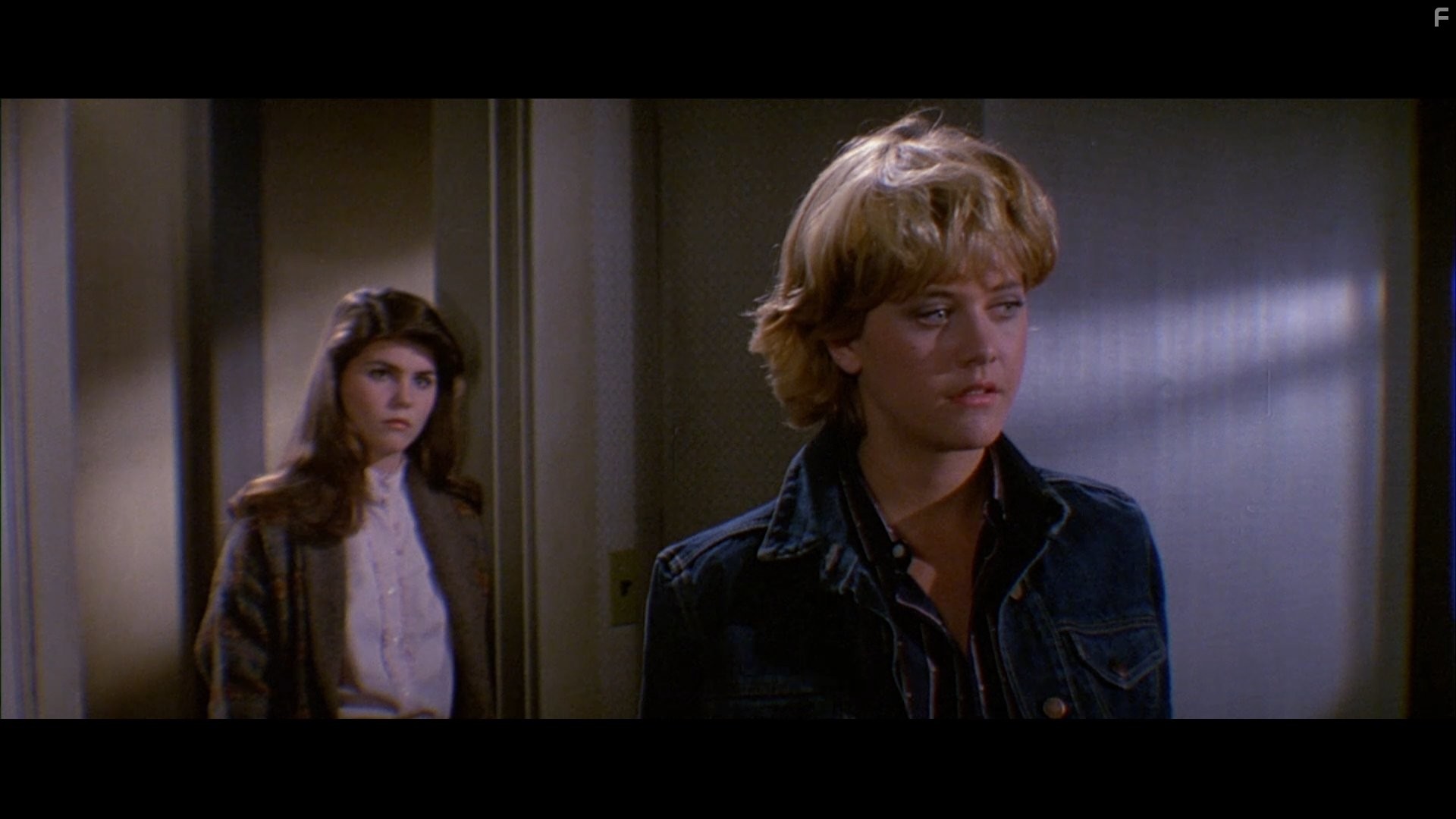 Meg Ryan and Lori Loughlin in Амитивилль 3-D (1983)