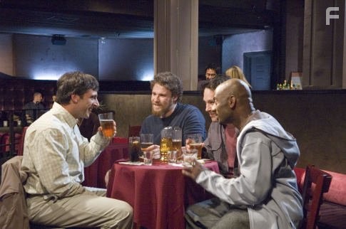 Steve Carell, Romany Malco, Seth Rogen, and Paul Rudd in Сорокалетний девственник (2005)