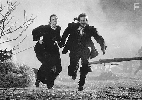 After imprisonment, and suffering disgrace and humiliation for participating in an adulterous affair, Hester Prynne (Demi Moore) and Reverend Dimmesdale (Gary Oldman) barely escape execution for their illegal crime of falling in love.