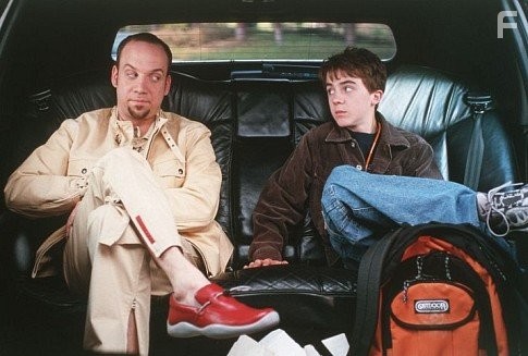 Frankie Muniz and Paul Giamatti in Большой толстый лгун (2002)