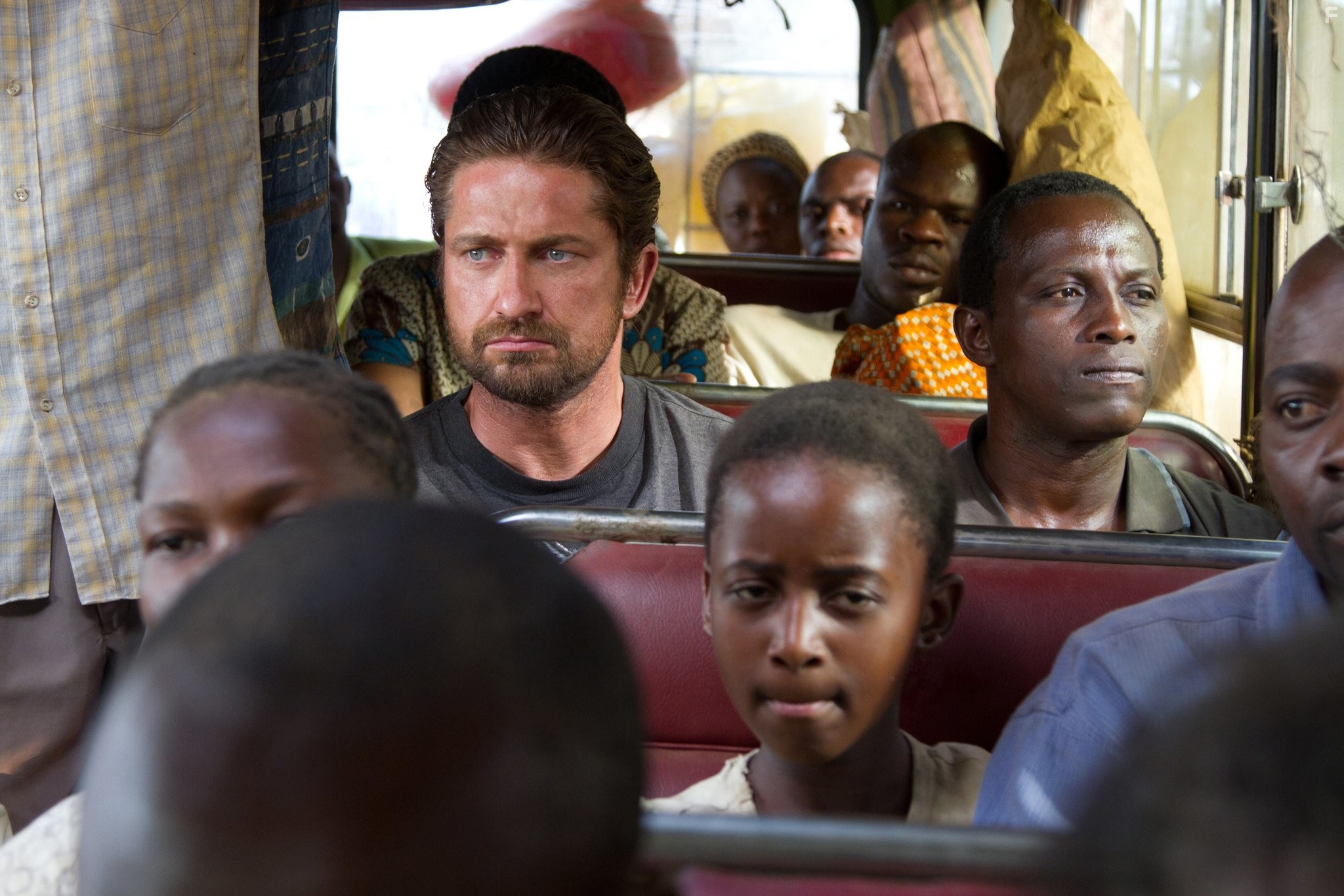 Gerard Butler and Souleymane Sy Savane in Проповедник с пулеметом (2011)