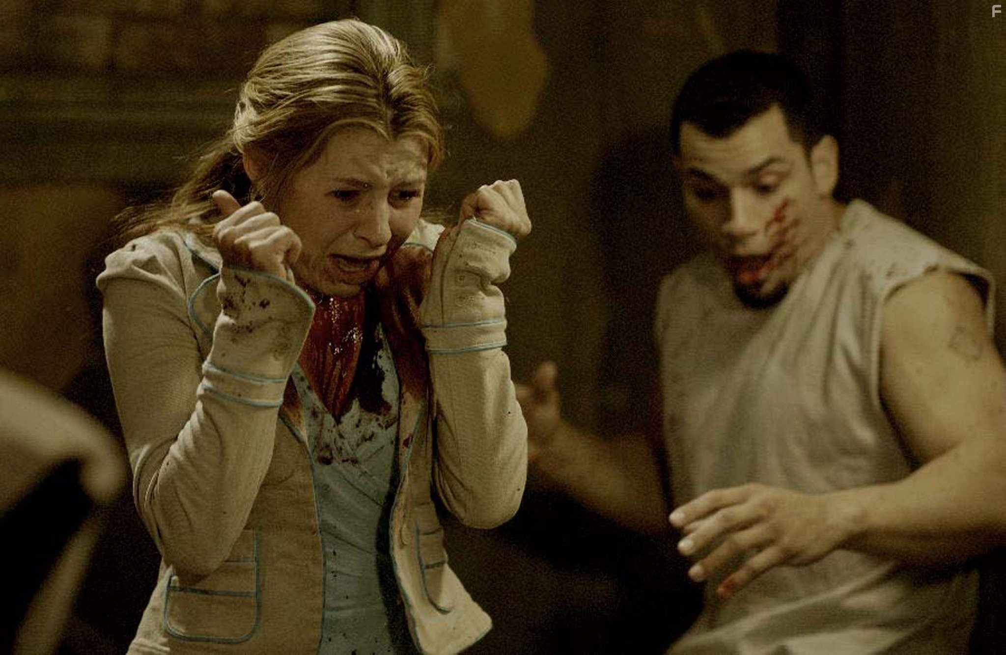 Beverley Mitchell and Franky G in Пила 2 (2005)