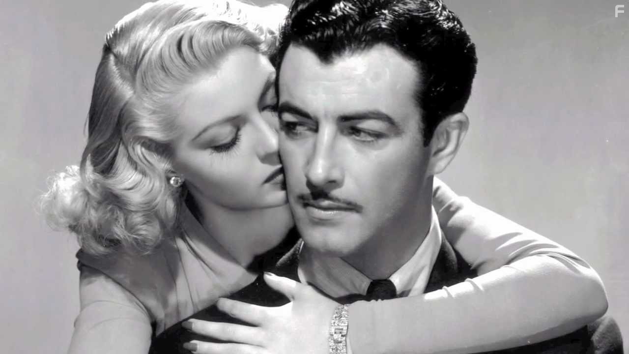 Robert Taylor and Lana Turner in Джонни Игер (1941)