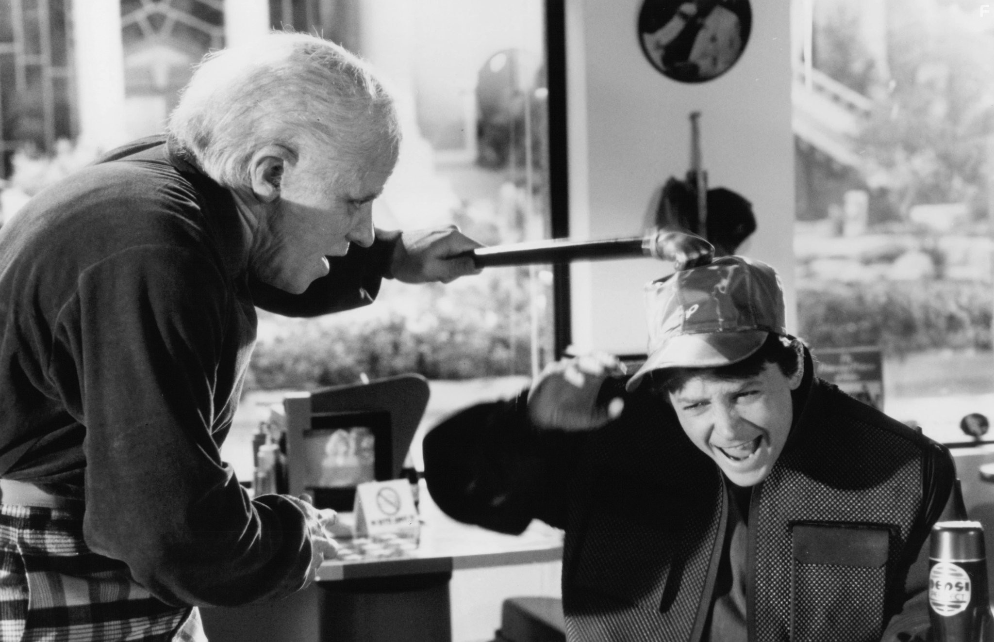 Michael J. Fox and Thomas F. Wilson in Назад в будущее II (1989)