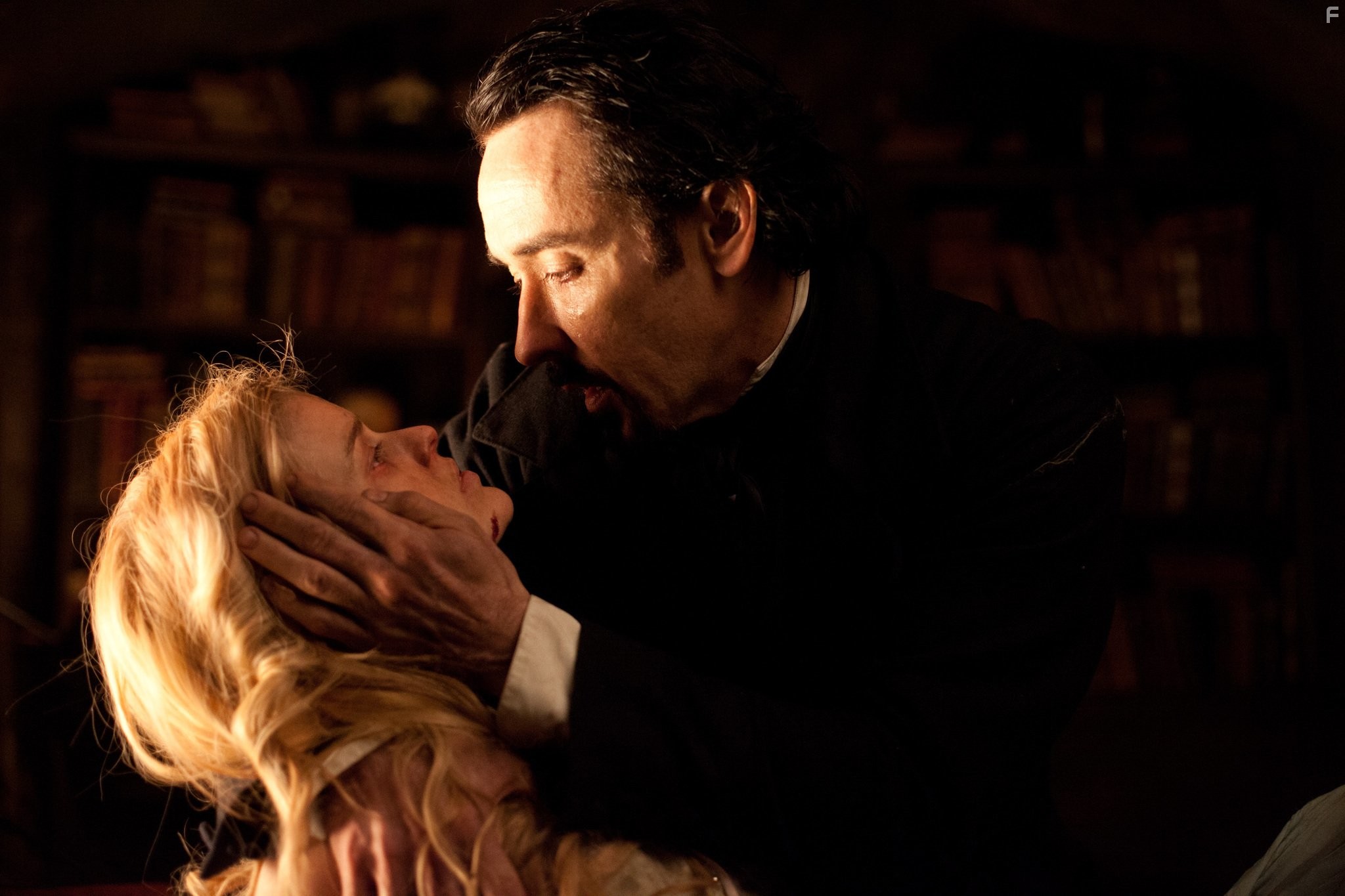 John Cusack and Alice Eve in Ворон (2012)
