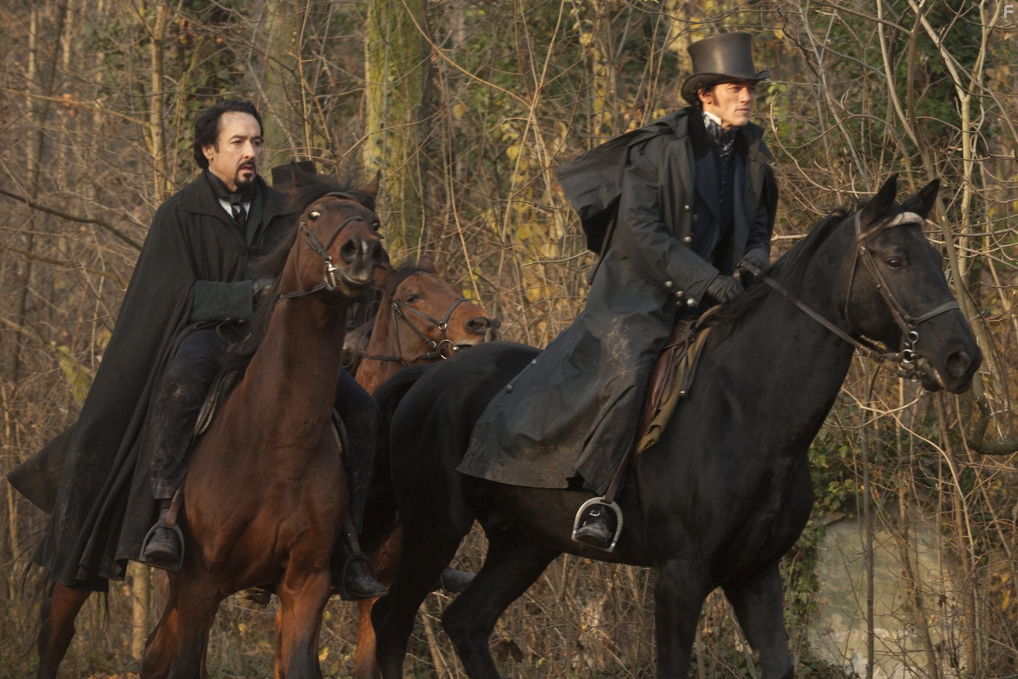 John Cusack and Luke Evans in Ворон (2012)