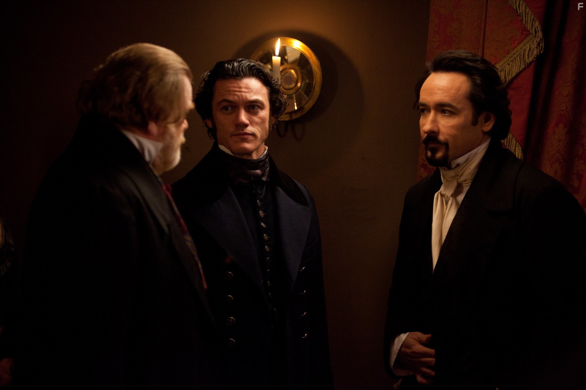 John Cusack, Brendan Gleeson, and Luke Evans in Ворон (2012)
