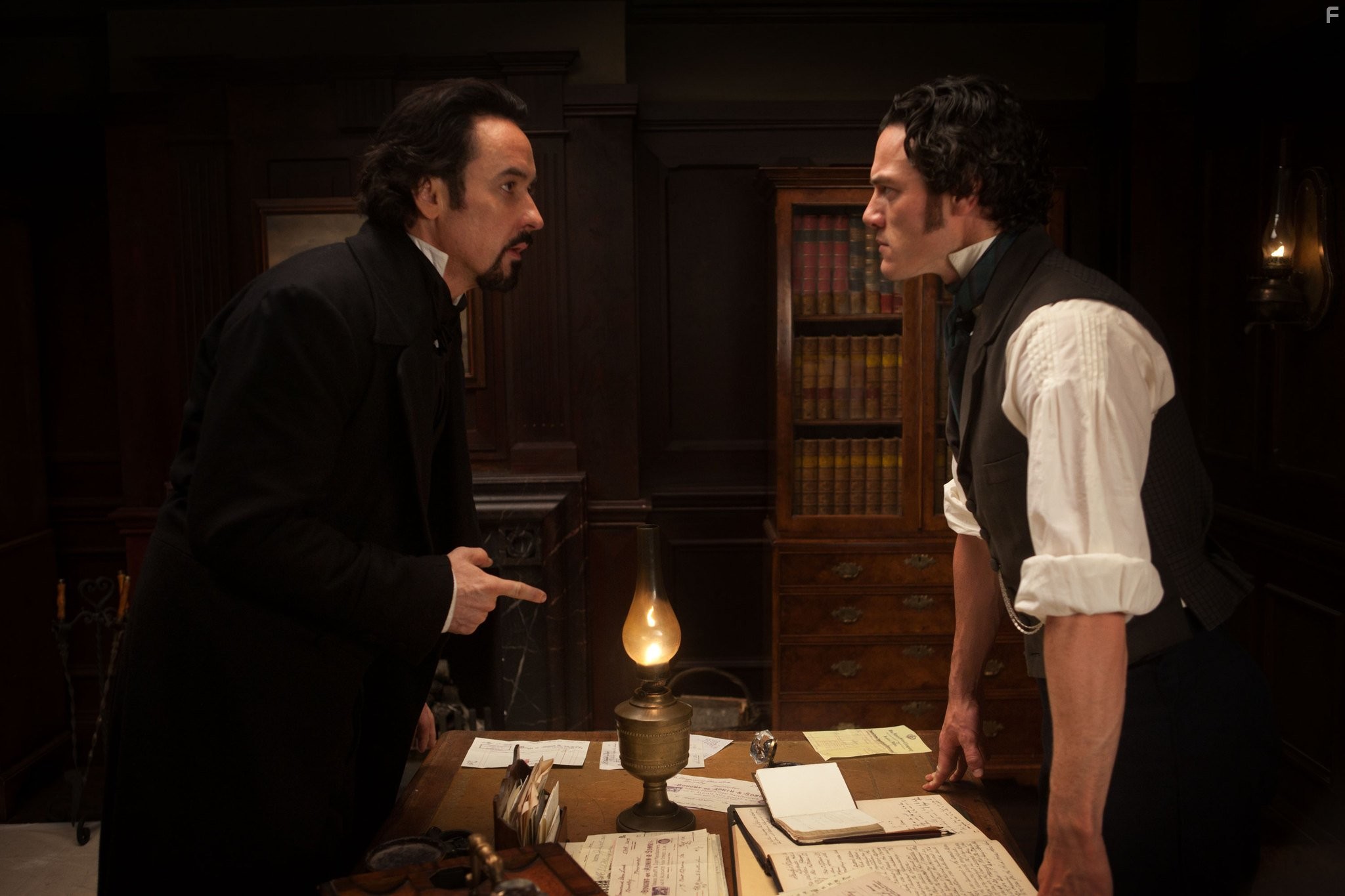 John Cusack and Luke Evans in Ворон (2012)