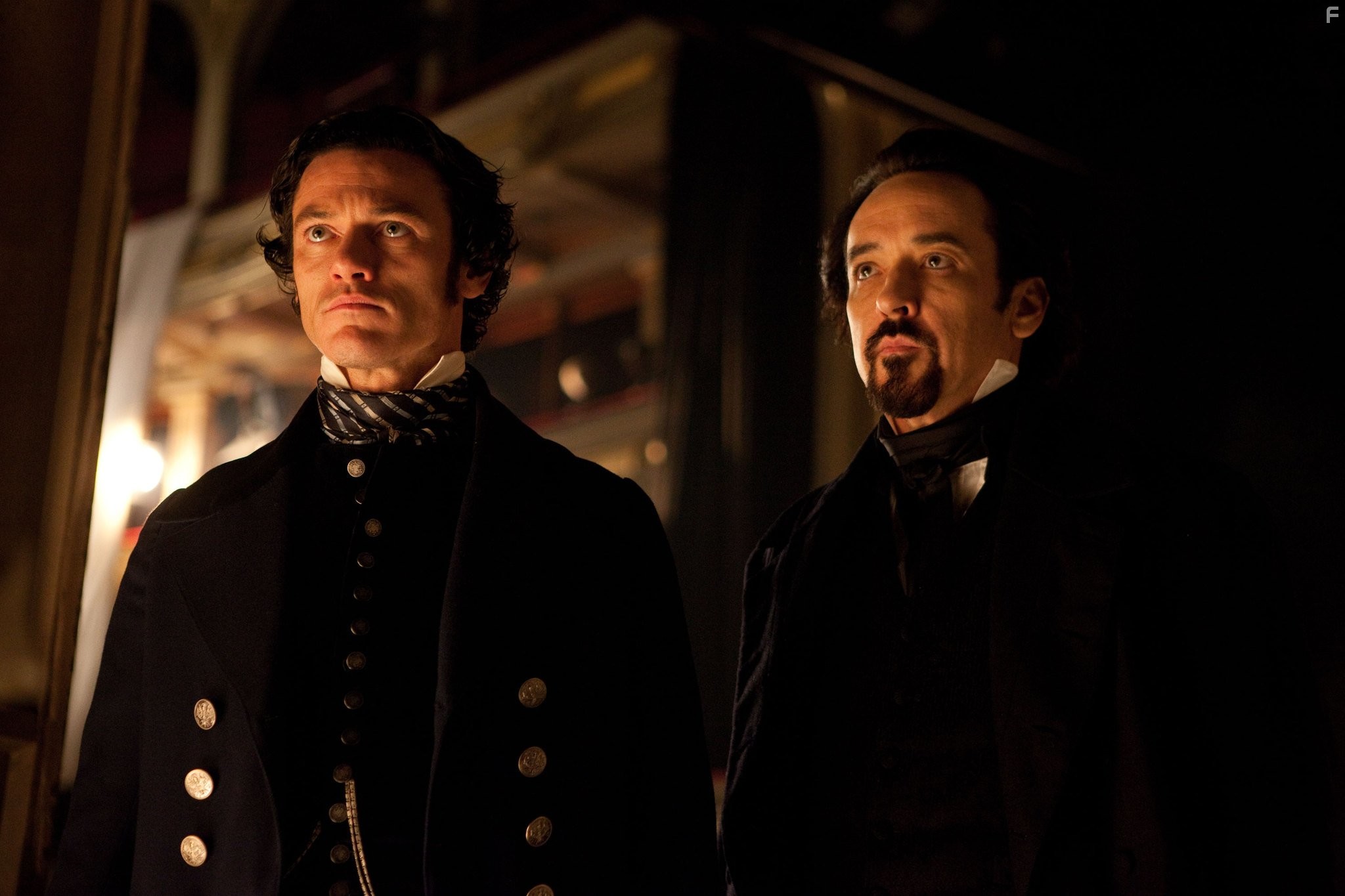 John Cusack and Luke Evans in Ворон (2012)
