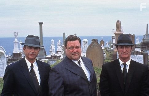 John Goodman, Sam Neill, and Bryan Brown in Dirty Deeds (2002)