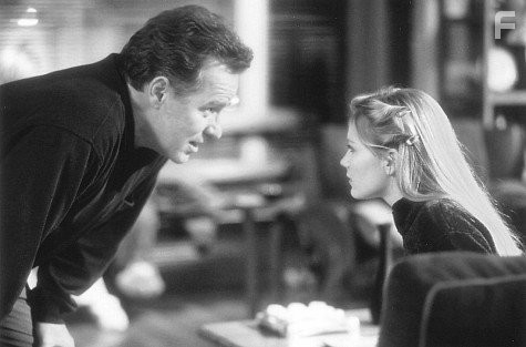 Kirsten Dunst and Phil Hartman in Солдатики (1998)