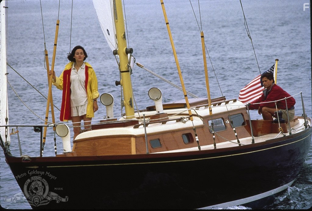 Rob Lowe and Meg Tilly in Маскарад (1988)