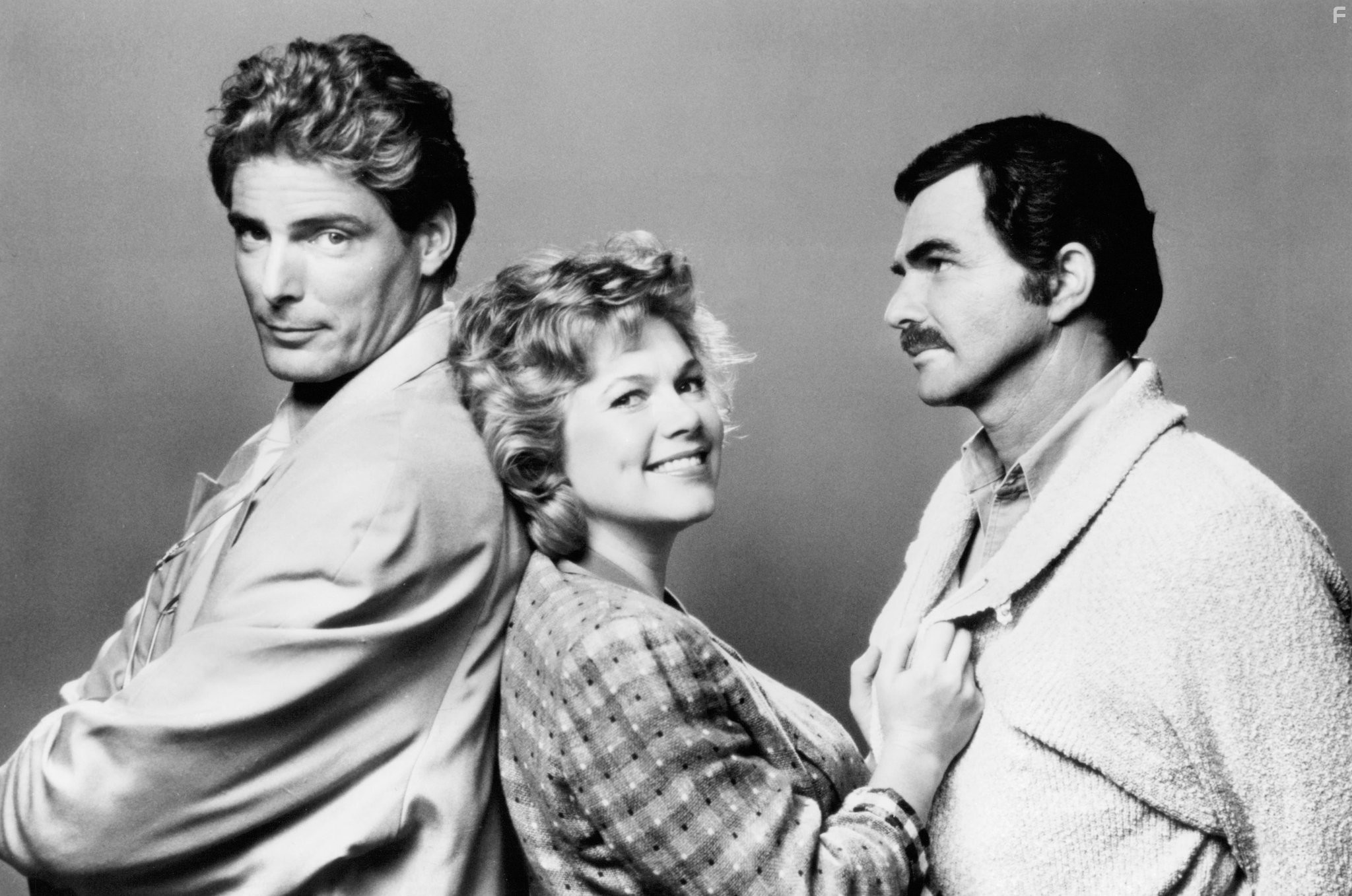 Burt Reynolds, Kathleen Turner, and Christopher Reeve in Переключая каналы (1988)