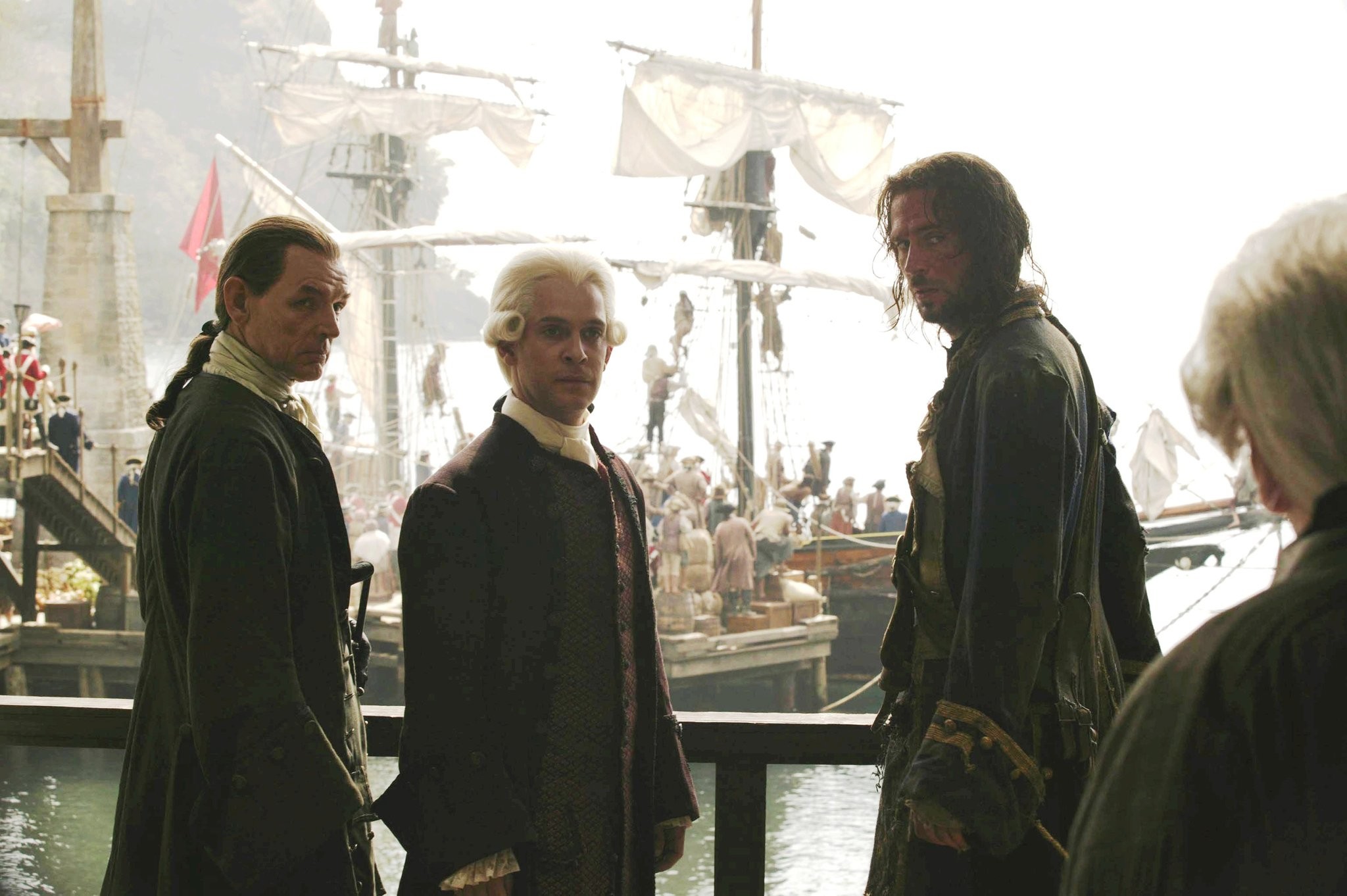 Jack Davenport and Tom Hollander in Пираты Карибского моря: Сундук мертвеца (2006)