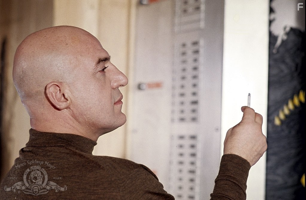 Telly Savalas in На секретной службе Ее Величества (1969)