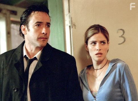 John Cusack and Amanda Peet in Идентификация (2003)