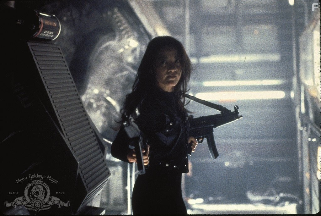 Michelle Yeoh in Завтра не умрёт никогда (1997)