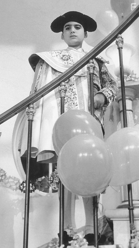 The Spanish Ambassador's son, Pepito (Kristian De La Osa) makes a dramatic entrance at his birthday party dressed in a traditional toreador's costume.