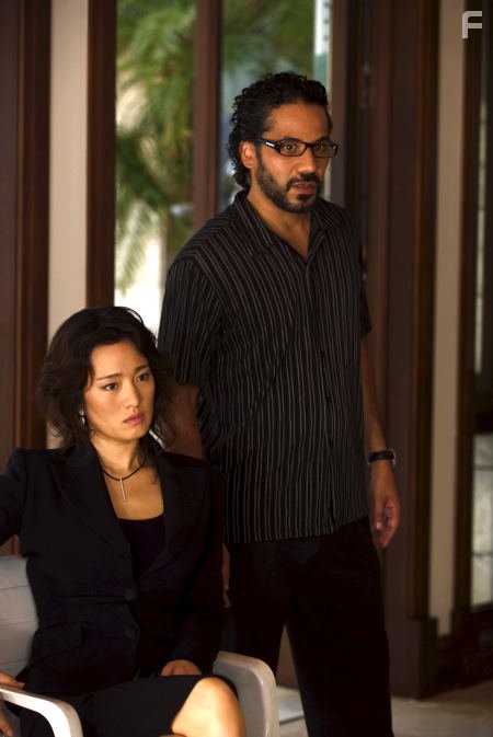 Li Gong and John Ortiz in Полиция Майами. Отдел нравов (2006)