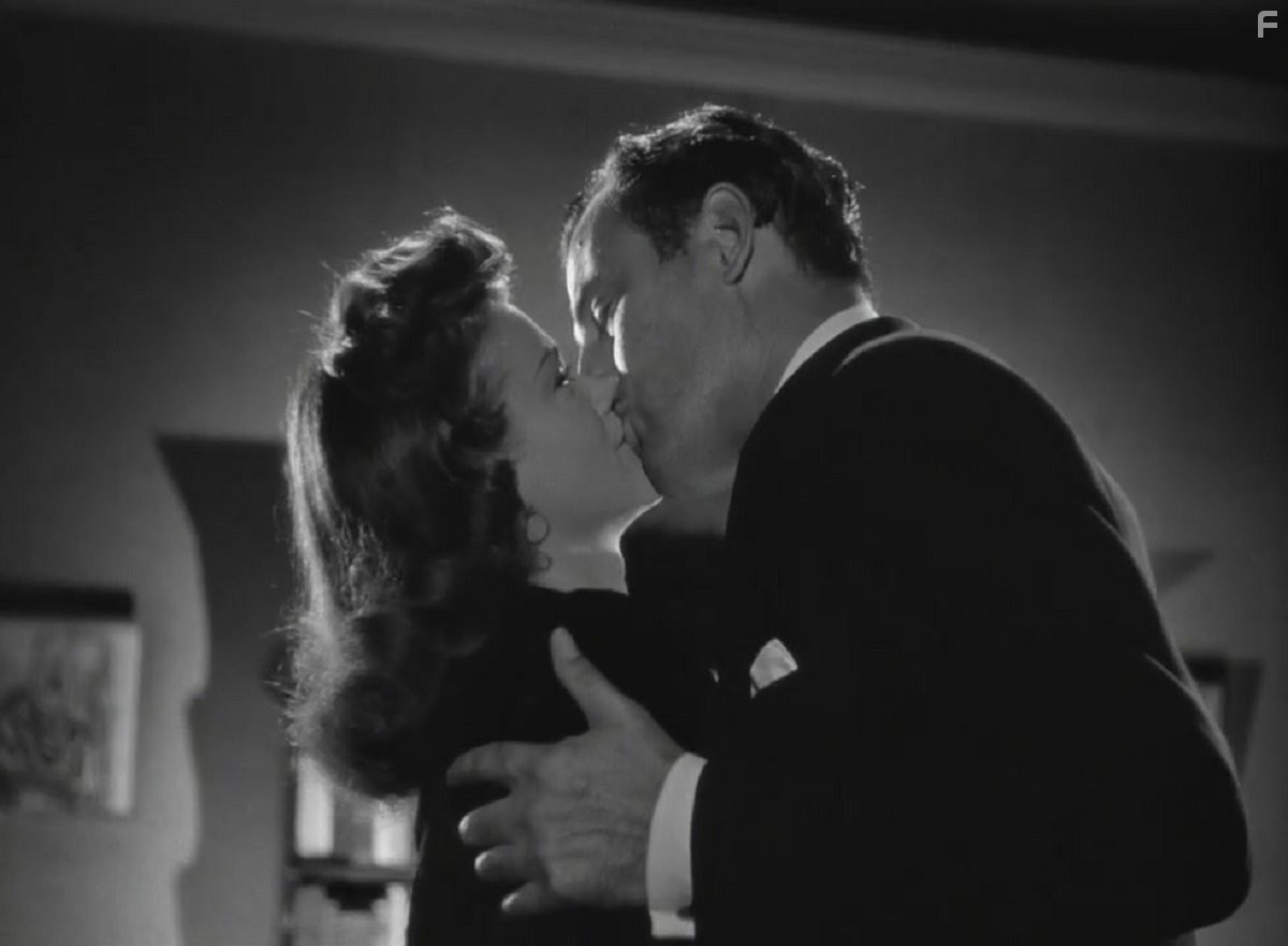 Tom Conway and Simone Simon in Люди-кошки (1942)