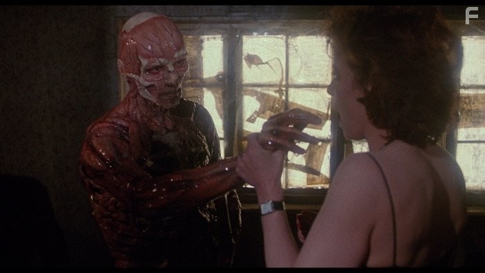 Clare Higgins and Oliver Smith in Восставший из ада (1987)