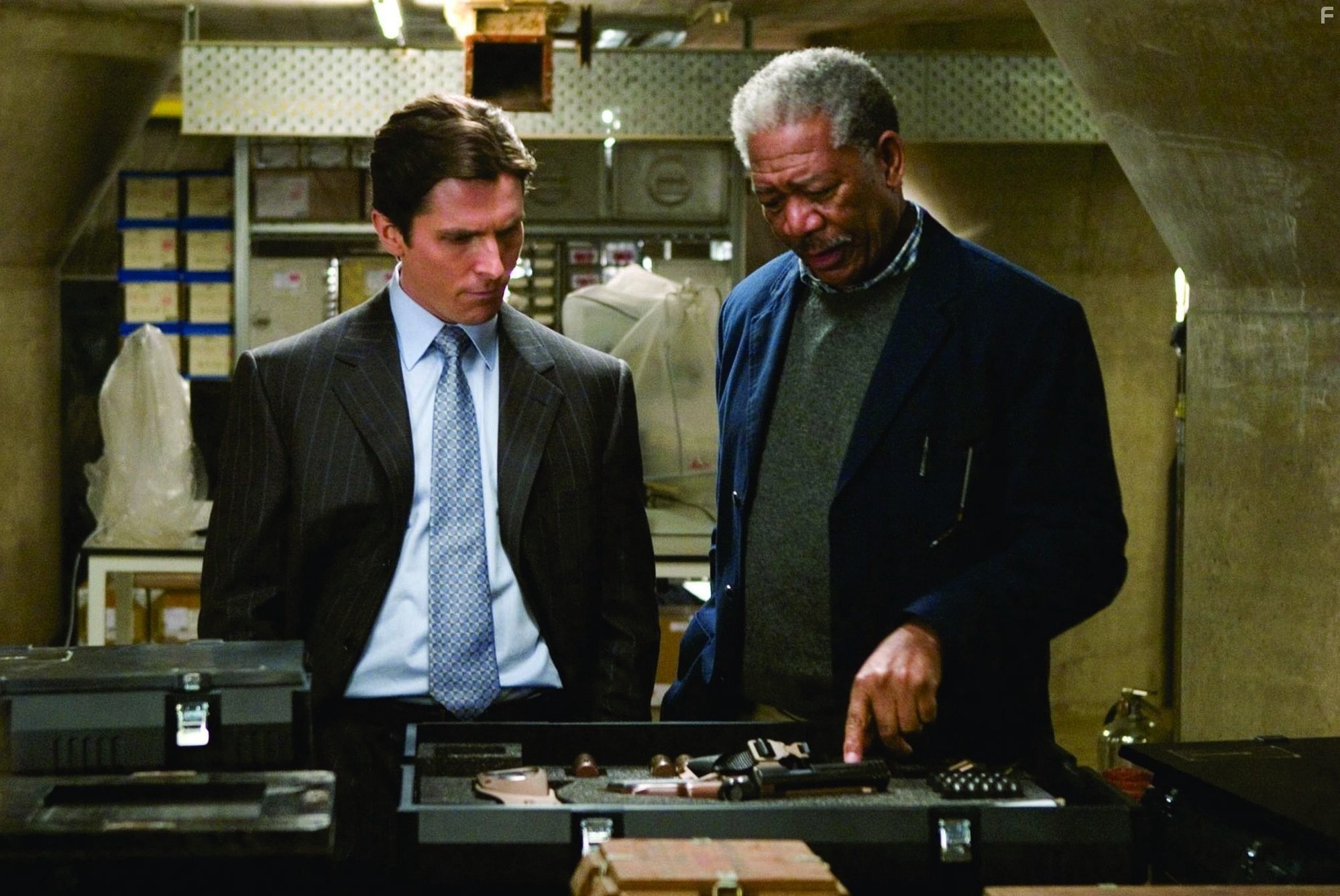 Morgan Freeman and Christian Bale in Бэтмен: Начало (2005)