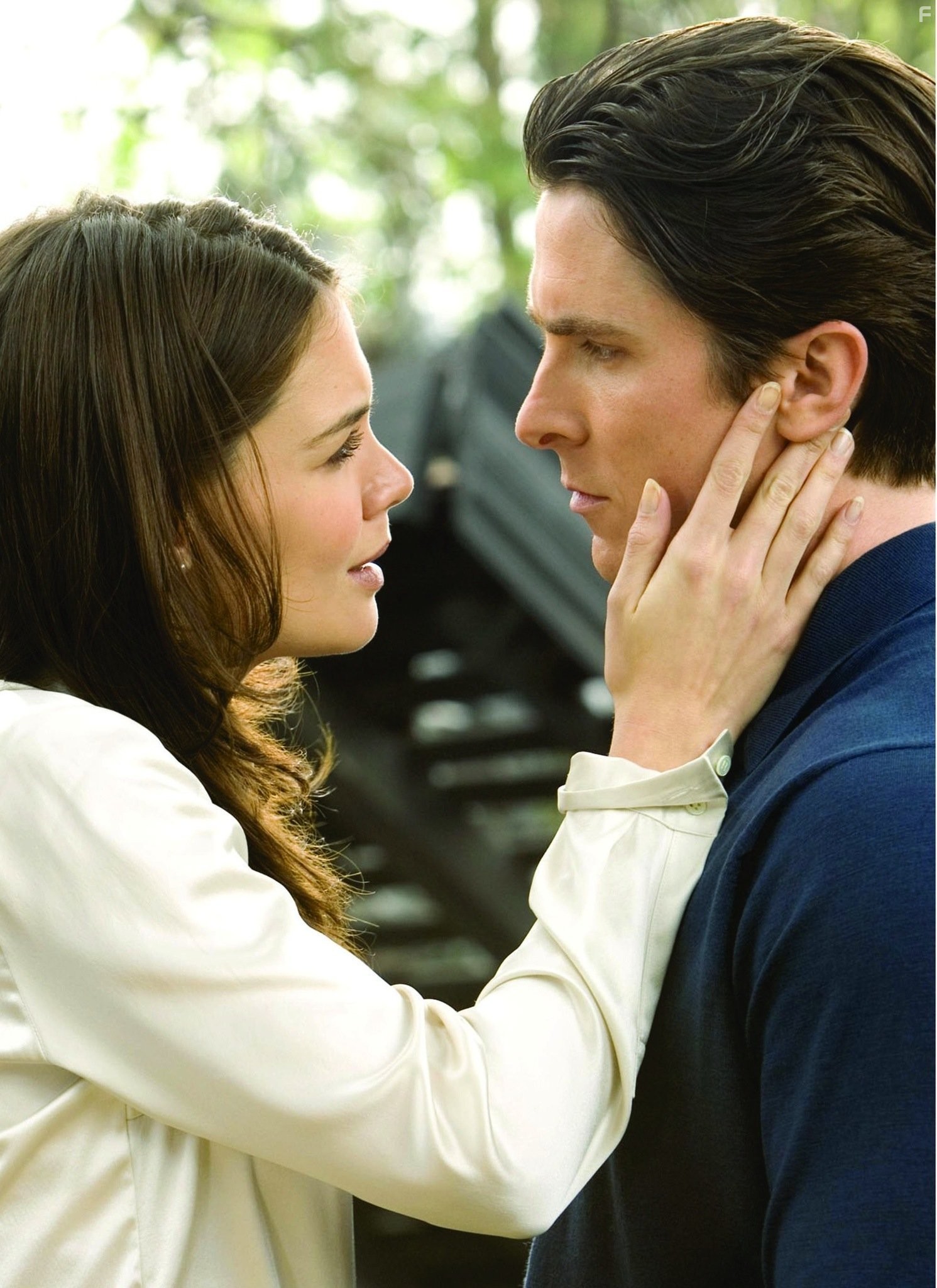 Christian Bale and Katie Holmes in Бэтмен: Начало (2005)