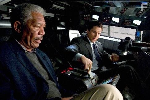 Morgan Freeman and Christian Bale in Бэтмен: Начало (2005)