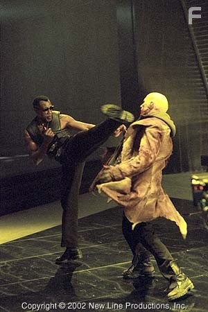 Blade (Wesley Snipes, left) and Nomak (Luke Goss) battle in New Line Cinema's action thriller, BLADE II.