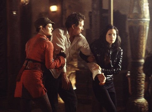 Drew Barrymore, Robert Patrick, and Lucy Liu in Ангелы Чарли: Только вперёд (2003)