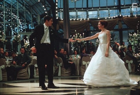 Just-marrieds Jim (JASON BIGGS) and Michelle (ALYSON HANNIGAN) dance on the happiest day of their lives (sort of).
